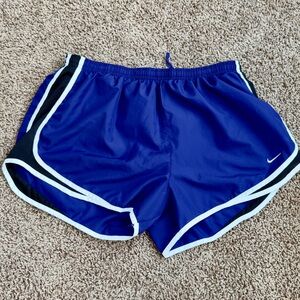 NIKE DRI FIT WOMENS ATHLETIC BRIEF LINED SHORTS PURPLE WHITE